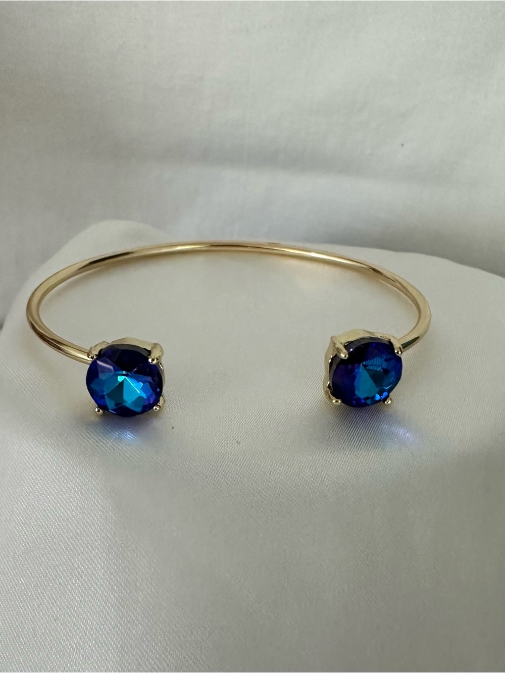 Gold Open Cuff Bracelet with Blue Crystal Ends